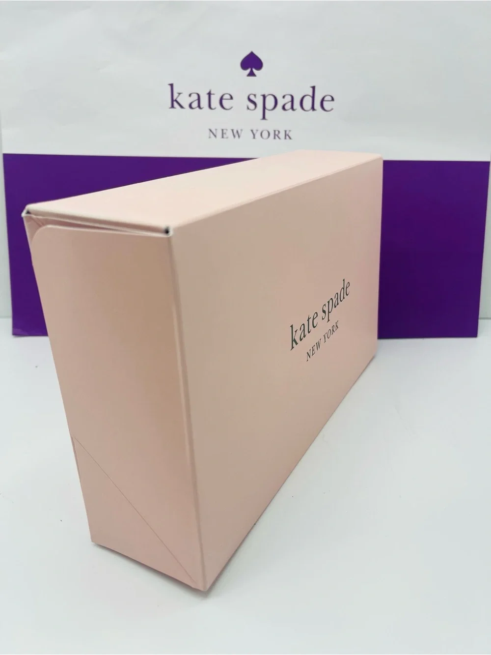 kate spade blush pink gift box with purple logo bag New